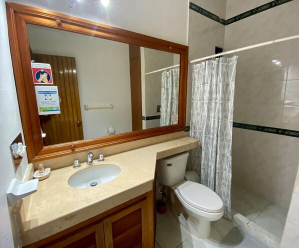Shower, towels, toilet paper