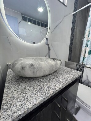 Shower, towels, soap, shampoo