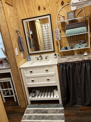 Hair dryer, towels, soap, toilet paper