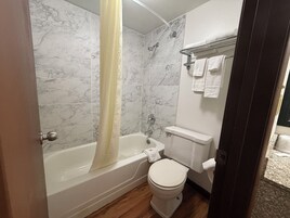 Shower, rainfall showerhead, towels, soap