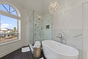 Bathtub, hair dryer, towels
