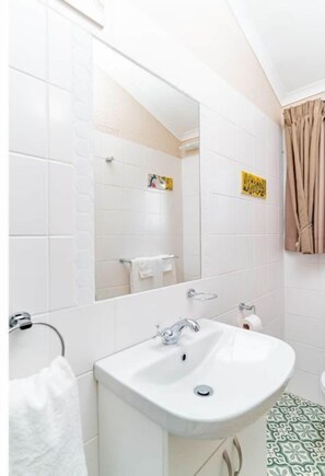 Eco-friendly toiletries, towels, soap, toilet paper