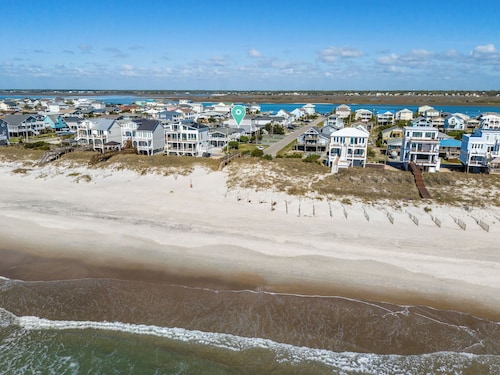 Steps to the beach. Canal front with new dock. Clean, Cozy Getaway.  
