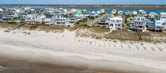 Steps to the beach. Canal front with new dock. Clean, Cozy Getaway.  