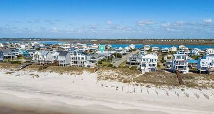 Steps to the beach. Canal front with new dock. Clean, Cozy Getaway.