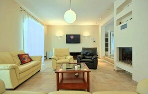 TV, fireplace, DVD player, foosball