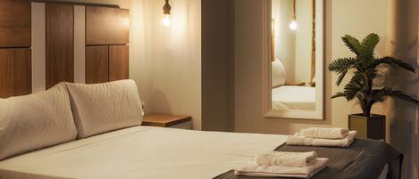 Fer et planche à repasser, lit parapluie, Wi-Fi, draps fournis