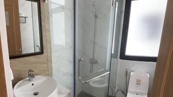 Hydromassage showerhead, free toiletries, hair dryer, bathrobes