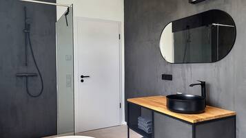 Bathtub, hair dryer, towels
