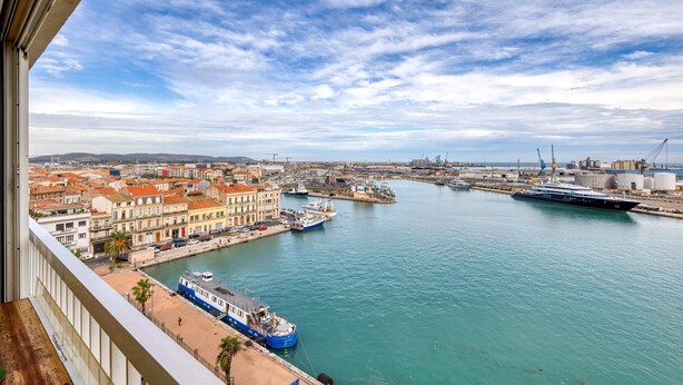 A harbor with boats, buildings, and a clear sky. - F4 Crossing Sea View with Garages and Balconies (Sète)
