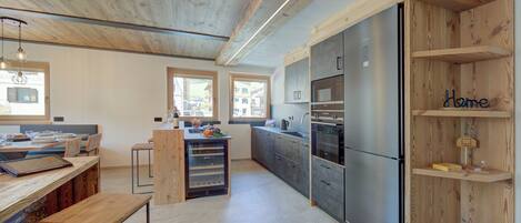 Family Apartment, Multiple Bedrooms, 2 Bathrooms (Wood House Livigno Ski in - Ski out) | Private kitchen | Fridge, microwave, oven, stovetop