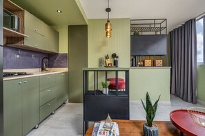 Fridge, microwave, stovetop, coffee/tea maker
