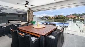 Outdoor dining - Relax Poolside by the Canal (BONGAREE)