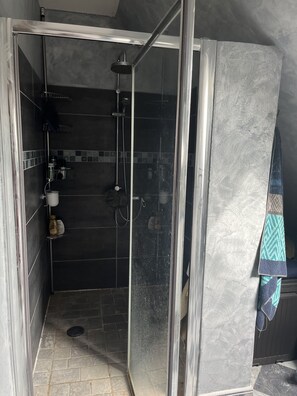 Shower, towels, soap, shampoo