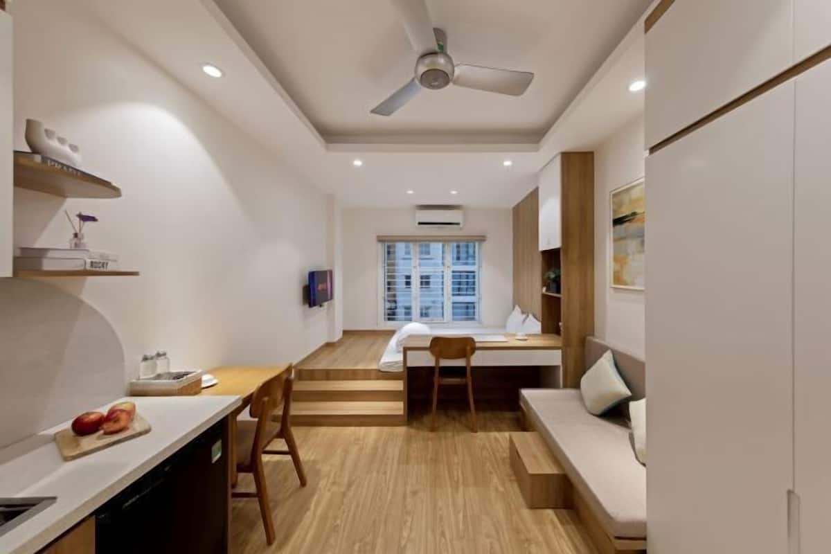 Premium bedding, desk, laptop workspace, blackout curtains