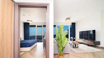 Deluxe-íbúð | 1 svefnherbergi, öryggishólf í herbergi, myrkratjöld/-gardínur