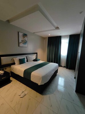 Deluxe Room | In-room safe, soundproofing, free WiFi, bed sheets