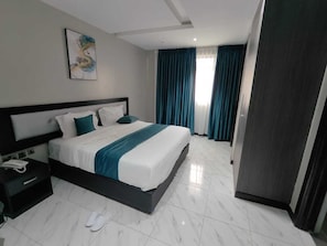 Deluxe Room | In-room safe, soundproofing, free WiFi, bed sheets