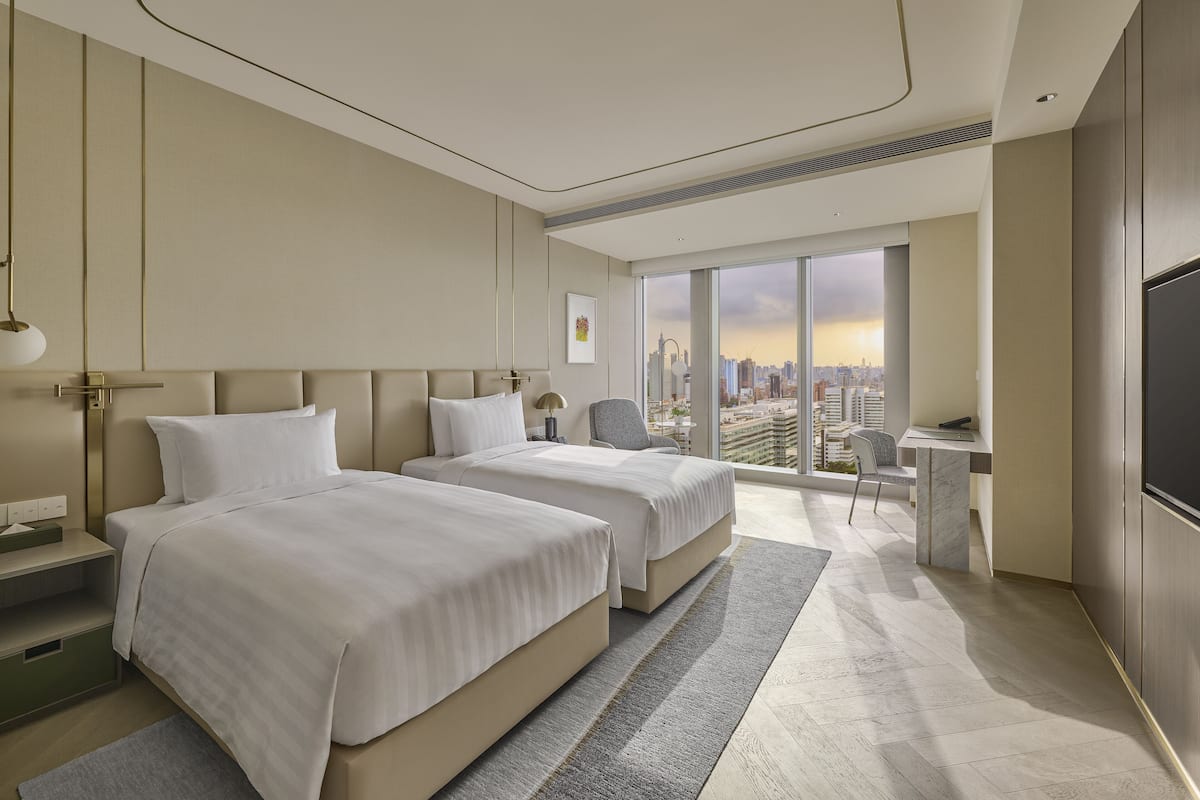 Deluxe Twin Room | 1 bedroom, premium bedding, down comforters, minibar