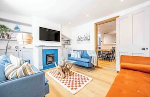 Smart TV, fireplace, books