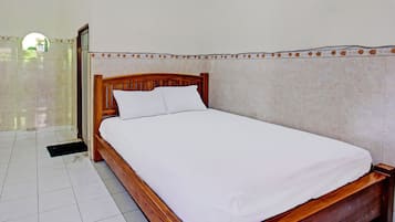 Habitación doble Deluxe | Espacio para trabajar con laptop, wifi gratis y ropa de cama