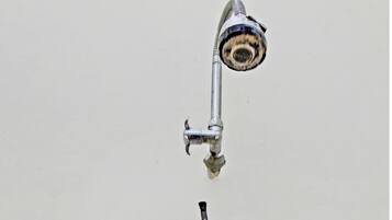 Habitación doble Deluxe | Baño | Regadera y toallas