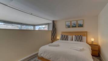 1 dormitorio, tabla de planchar con plancha, cuna de viaje y wifi