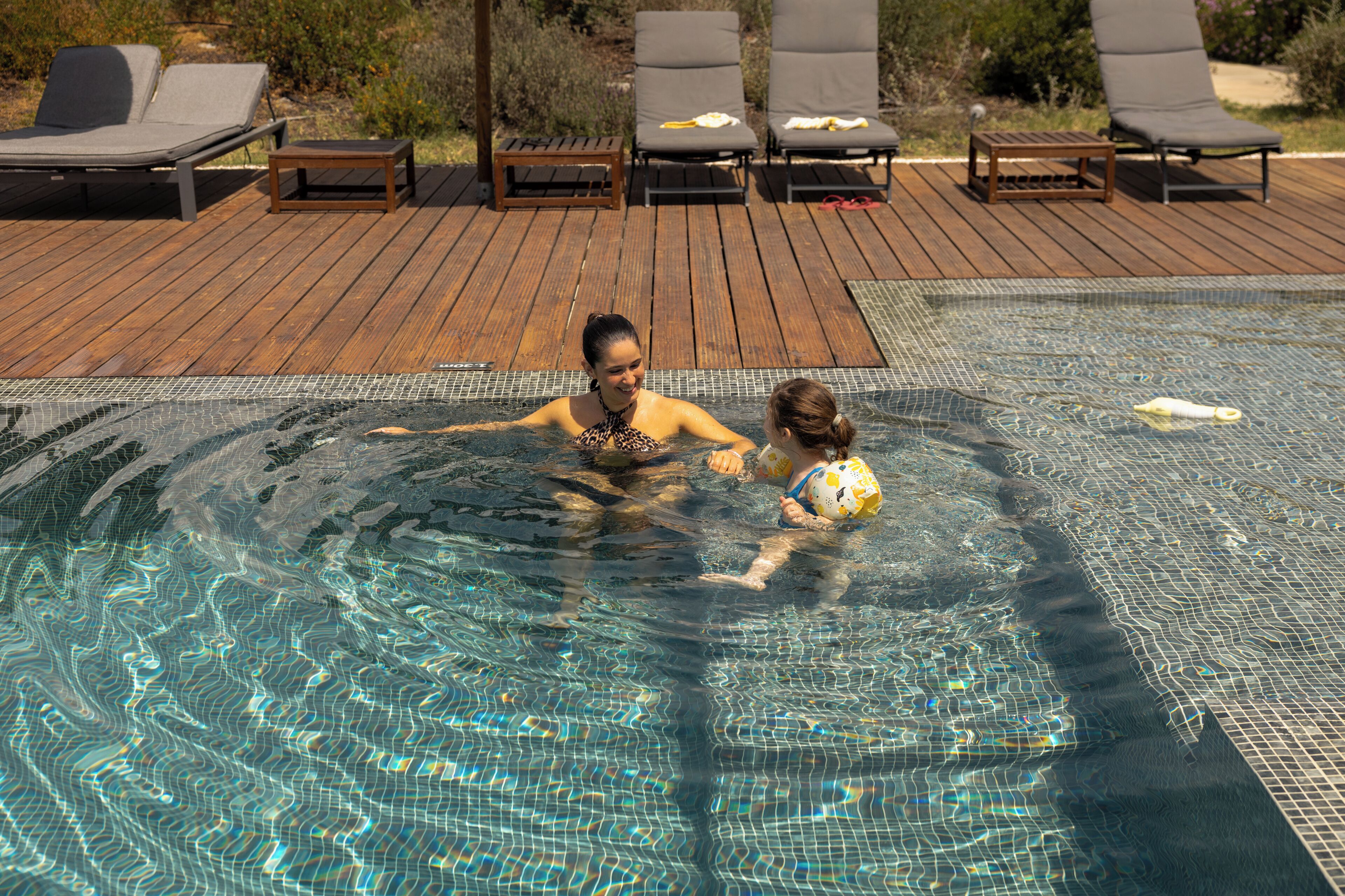 Outdoor pool, a heated pool, pool umbrellas, sun loungers