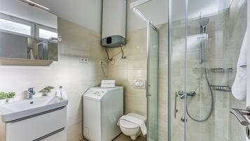 Standard Apartment, Multiple Bedrooms, Sea Facing (Valdarke Seaside Apartment) | Bathroom | Shower, hair dryer, towels, soap