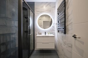 Hair dryer, towels, soap, shampoo