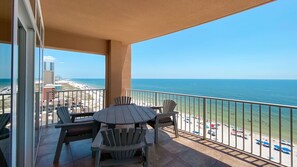 Outdoor dining - Beachfront 4BR Corner Unit!  Water Slide!! (Gulf Shores)
