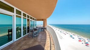 Outdoor dining - Beachfront 4BR Corner Unit!  Water Slide!! (Gulf Shores)