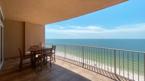 Outdoor dining - Beachfront 4BR Corner Unit! Water Slide!! (Gulf Shores)