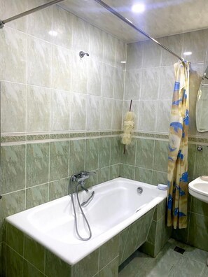 Basic Shared Dormitory, 1 Twin Bed, City View | Bathroom | Combined shower/tub, deep soaking tub, bidet, towels - S. T. Hostels (Baku)