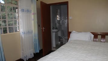 Standard Room | Bathroom | Rainfall showerhead, slippers, towels