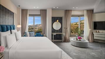 Sea View Deluxe Room | Minibar, in-room safe, desk, blackout drapes