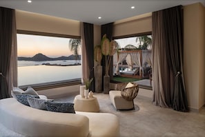 Suite, vue mer (Swim Up Sunset Suite) | 1 chambre, minibar, coffres-forts dans les chambres, bureau