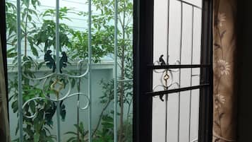 Standard Twin Room, Ground Floor | Desk, laptop workspace, free WiFi, bed sheets