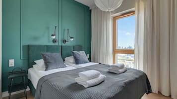 Apartamento superior | Ropa de cama hipoalergénica, tabla de planchar con plancha, wifi gratis