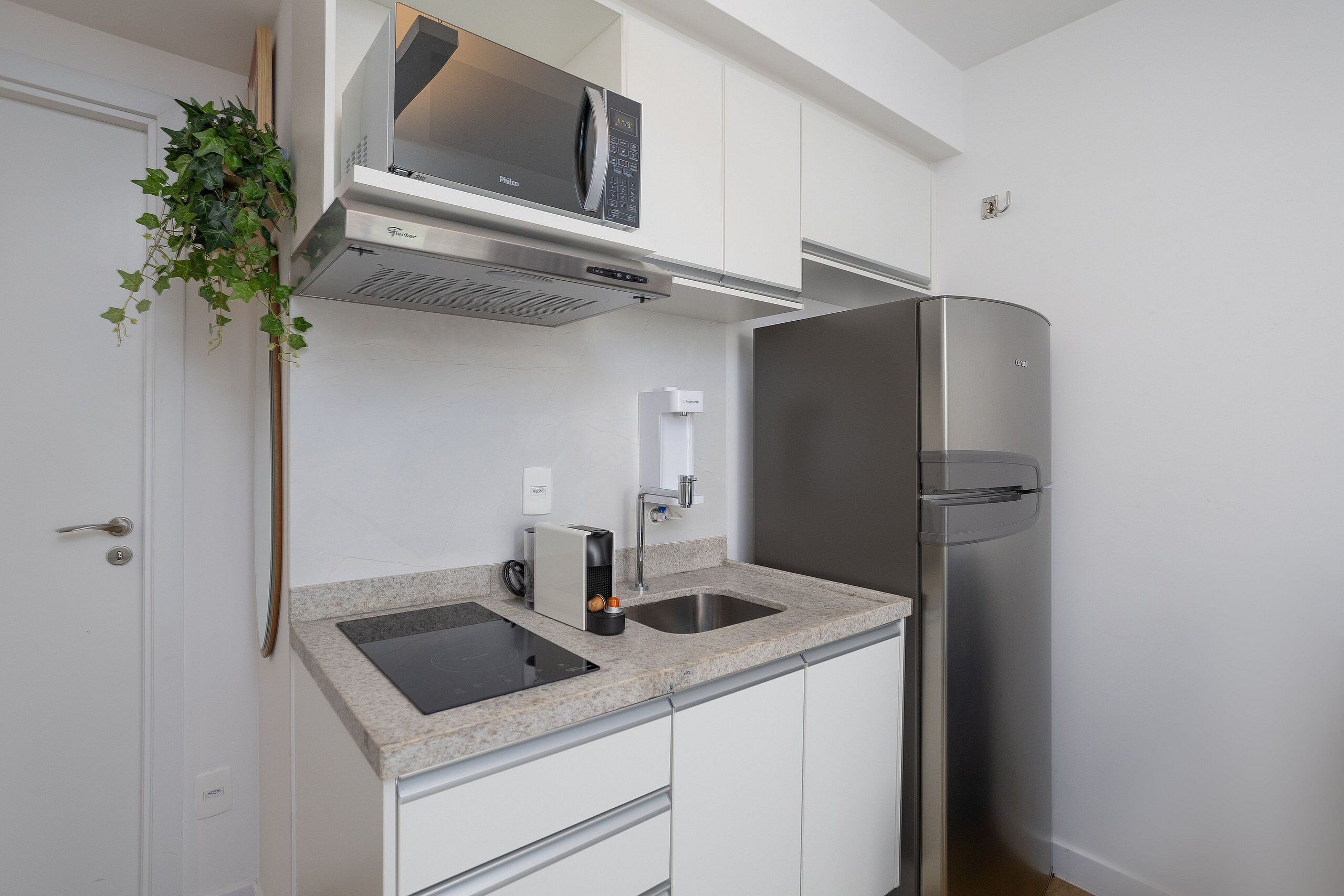 Apartamento executivo | Cozinha privada | Talheres/pratos/utensílios de cozinha