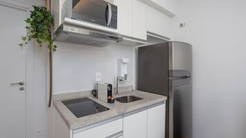Apartamento executivo | Cozinha privada | Talheres/pratos/utensílios de cozinha