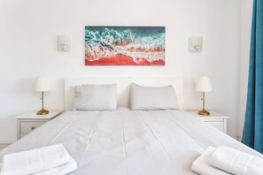 2 dormitorios, tabla de planchar con plancha, cuna de viaje y wifi