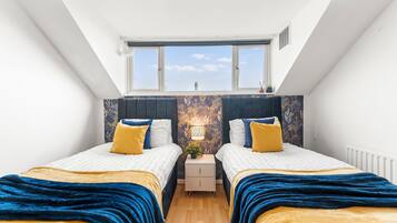 4 bedrooms, iron/ironing board, WiFi, bed sheets