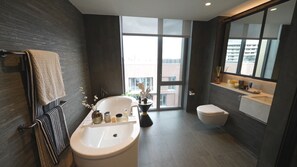Apartment, 2 Queen Beds | Bathroom | Separate tub and shower, deep soaking tub, hair dryer, towels
