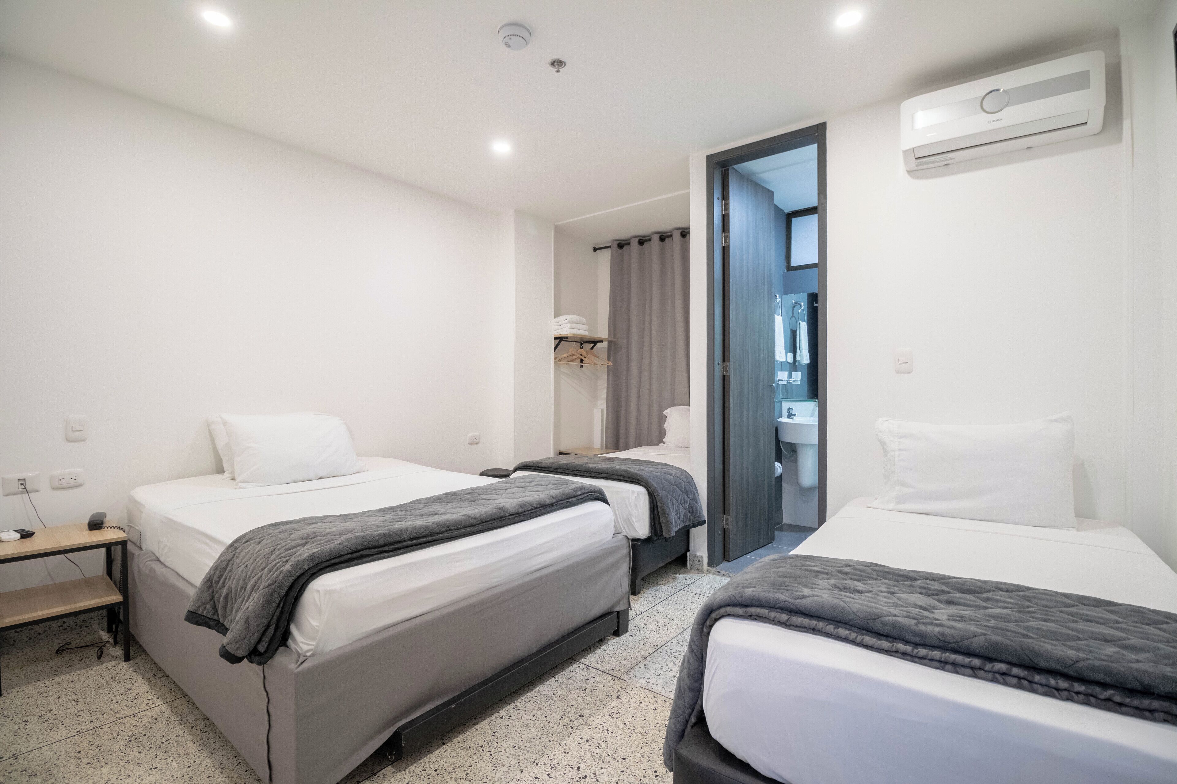 basic triple room | down duvets, desk, laptop workspace, free wifi