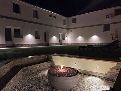 
Enchanting apartment complex with a stunning yard, gym, and sports equipment.