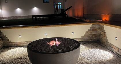 Enchanting apartment complex with a stunning yard, gym, and sports equipment.