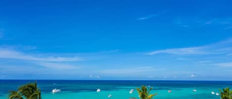 On the beach, sun-loungers, beach towels