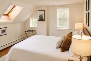 Skylight mornings, a tucked-away feel, and a simple layout make this bedroom easy to settle into for a couple or solo guest.
- 1820 House Steps to Ski Shuttle, Hot Tub, Stowe (Stowe)