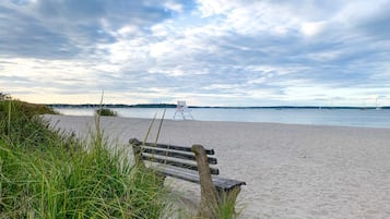 On the beach, sun loungers, beach towels
